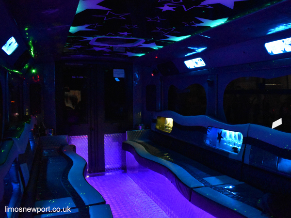 Interior view with disco lights and bench-style seating